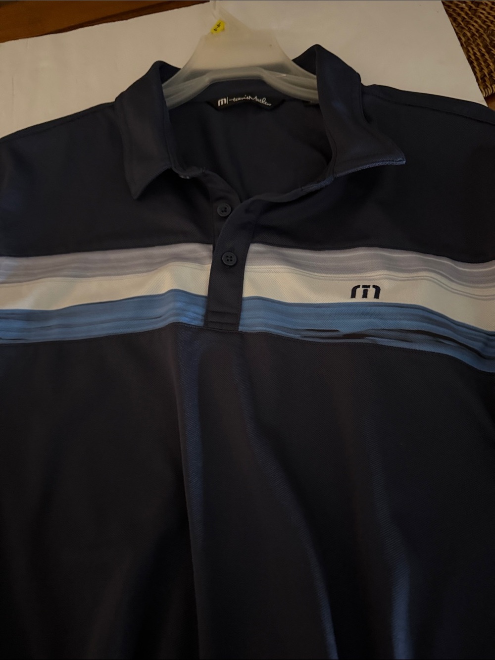 Travis Mathew Navy Polo with White and Light Blue Stripes